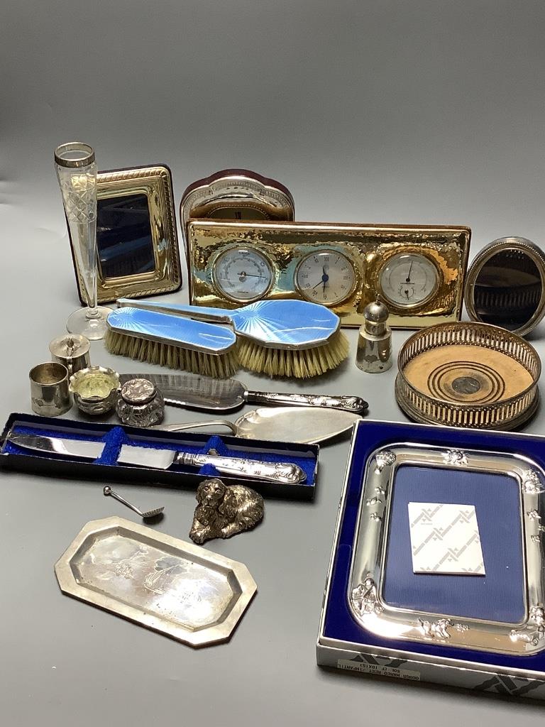 Modern items of silver including wine coaster, photograph frames, timepiece etc.